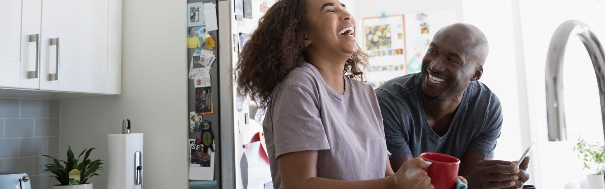 Man and woman laughing