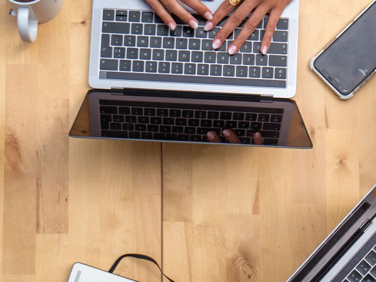 group working on laptops group working on laptops