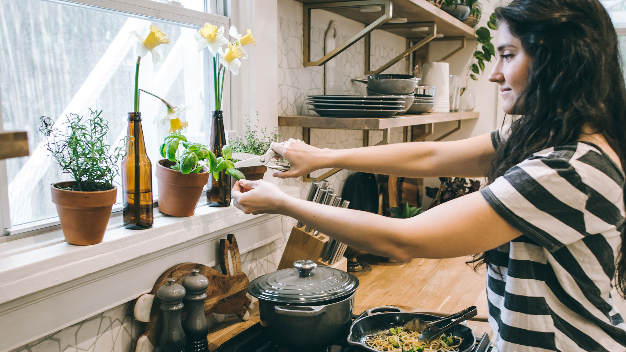 woman trimming plant