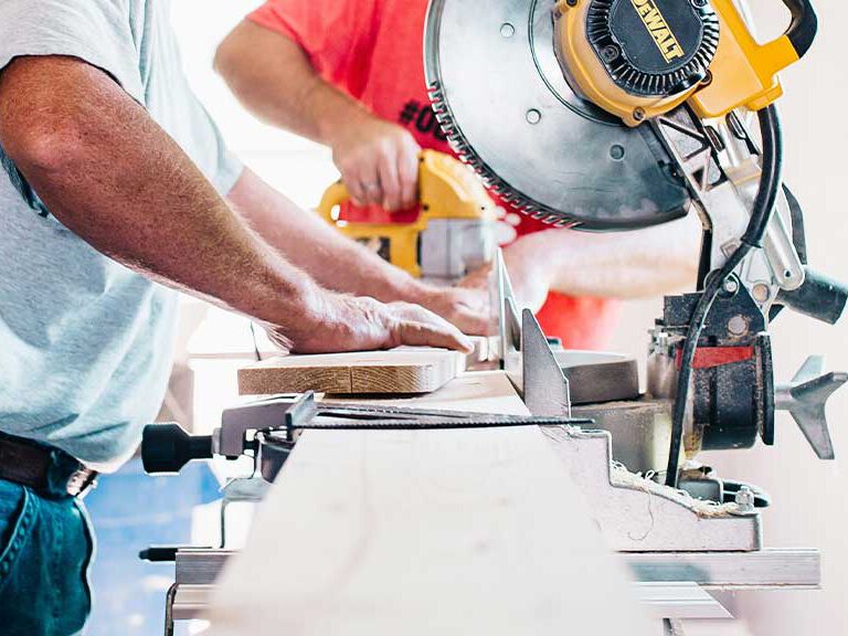 Builders on a construction site Builders on a construction site